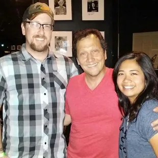 three people posing for a picture