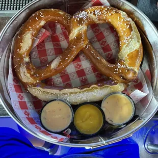 "Big Ass Pretzel with plenty of delish queso and powerful mustard!
