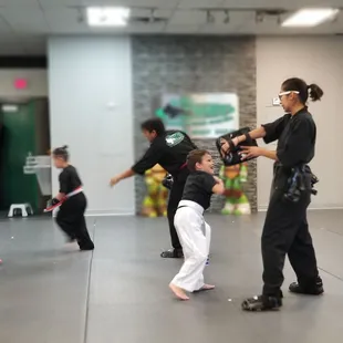 Instructors lead basic skills to loud house music!