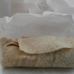 a burrito on a table