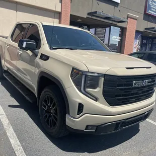 15% ceramic tint for driver and passenger and 5% on the back.