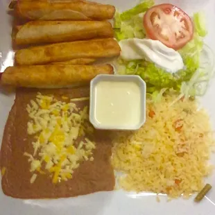 Our new dish. Flautas