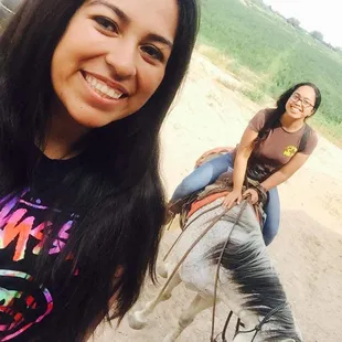 Took my friend visiting from fort. Lewis on a horse back riding through the orchards.