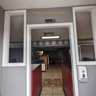 the entrance to el paso wing house