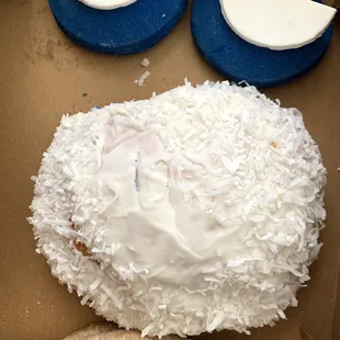 a cake with a face made out of coconut