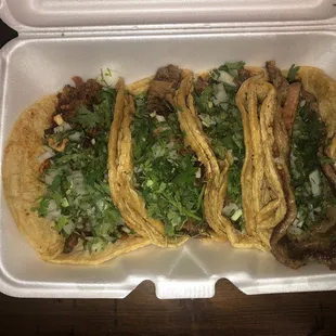 Tacos: Lengua, Lomo and Chorizo con Asada.