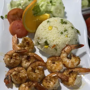 a plate of shrimp and rice
