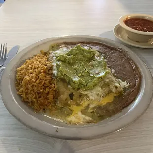Guacamole chicken and beef verde enchiladas with rice and beans