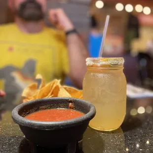 My happy place. Hubby, chips, salsa and a margarita.