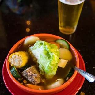 Our famous Caldo de Res (beef soup) served with corn, squash, carrot, potato and fresh cabbage.