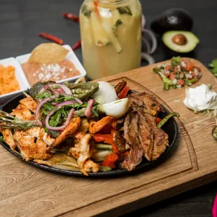 Our mixed fajitas are prepared with only the freshest and highest quality ingredients, Carne asada, plump shrimp, and tender chicken.