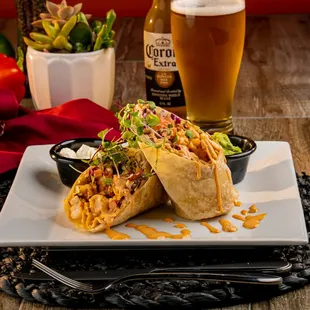 Shrimp or Mahi Mahi Burrito with Cabbage, green chipotle sauce, pico de gallo &amp; cotija cheese.