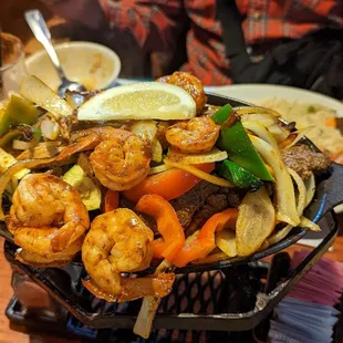 A close up of the trio fajitas platter