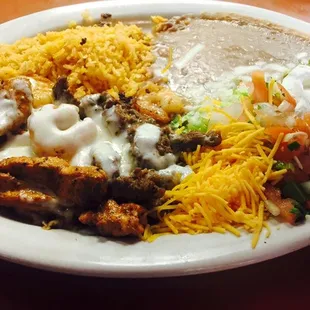 Fajita Plate, smothered in queso blanco