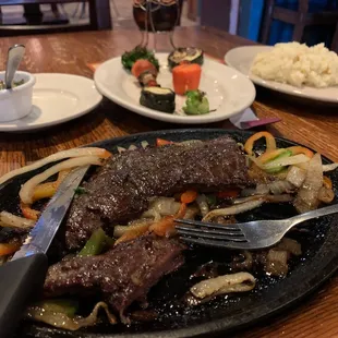 Skirt steak with vegetables.
