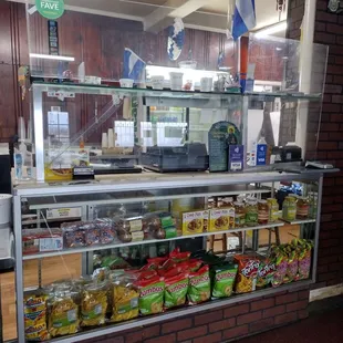 Salvadorean snacks (you can&apos;t see their fridge, but they do sell cola champagne)