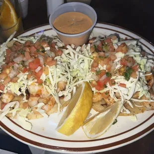 A la carte shrimp tacos. Some of the best I&apos;ve had. I always get the chipotle sauce on the side because it&apos;s a little spicy.