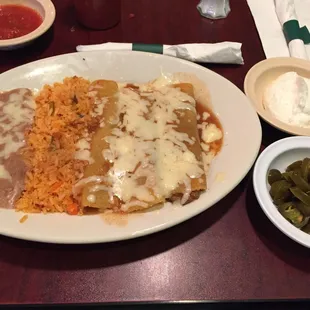 Enchiladas with sour cream &amp; jalapeños on the side