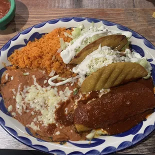 2 tacos, enchilada, rice and beans