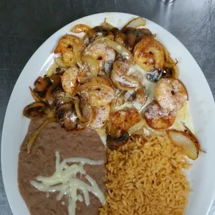 a plate of mexican food on a table