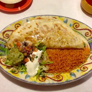 Quesadilla Fajita, covered in white cheese upon my request.