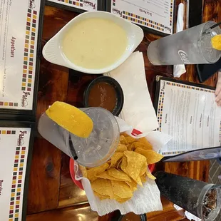 a person cutting a tortilla