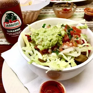 Veggie burrito bowl without sour cream and cheese. Delicious!!! The veggies included bell peppers, onions and mushrooms.