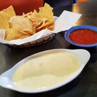 Cheese dip w/salsa &amp; chips.