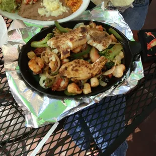 Whoever was the one said small portions is nuts or was super hungry Excellent service n good food!