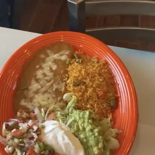 Rice , beans , guacamole, sour cream , picó