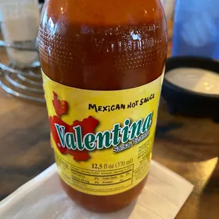 A decent, slightly hot sauce that's on the table.