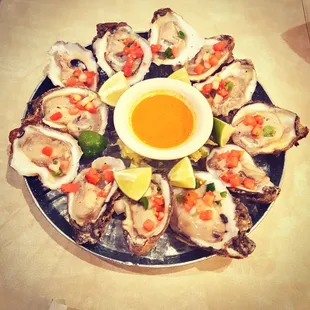 The "Oysters Preparardos!" $16 for a DOZEN, big fat &amp; sweet oysters!! Extremely surprised at the quality of the oysters!