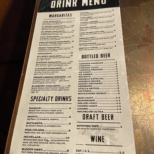 a drink menu on a table