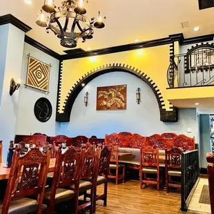 a dining room with a chandelier