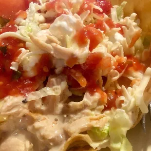 a plate of food with tortillas and salsa