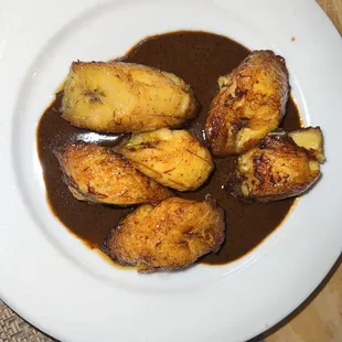 Plantains in mole sauce