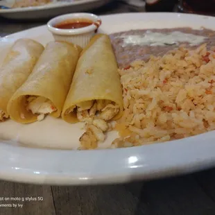 Crab enchiladas, Mexican rice, refried beans 07/20/2022