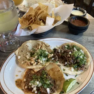 Chicken, steak, and barbecoa tacos.