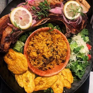 Kan Kan Pork Chop Yellow Rice with Pigeon Pea  Fried Green Plantains