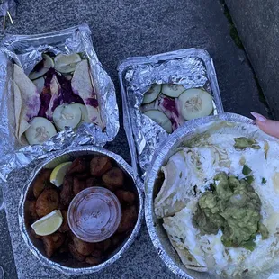 a person holding a plate of food