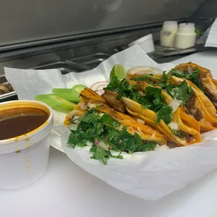 Birria tacos with consome for dipping