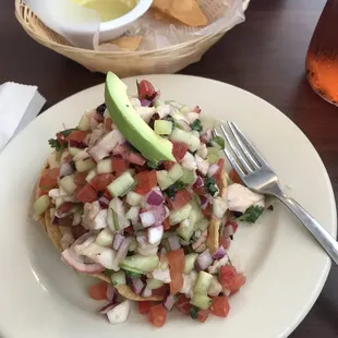 Pulpo/fish tostada