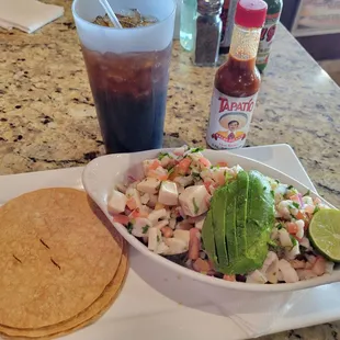 Ceviche de pescado, avocado add abolone.