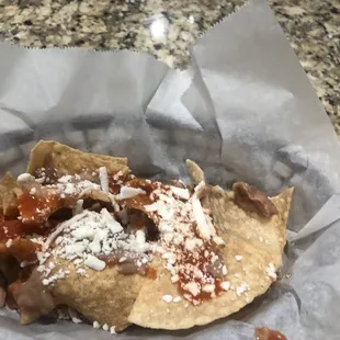 Complimentary chips.. with beans cheese and salsa! The best