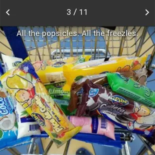 a shopping cart full of snacks