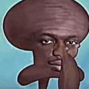 a man with a hat on his head