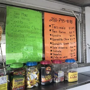 the menu for the taqueria