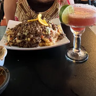 Carne Asada French fries &amp; strawberry margarita, bean dip, salsa