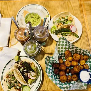 Tacos: chicken, carnitas, skrimp. Plantains. Guac. Assorted salsas, deliciousness