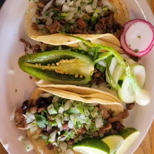 Carnitas Street Tacos... GET THEM. Thank me later with a thumbs up ;)
